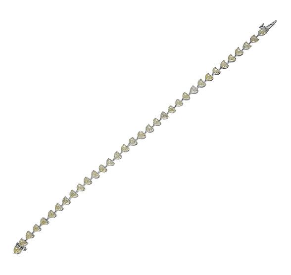 Heart Shape Diamond Channel White Gold Tennis Bracelet