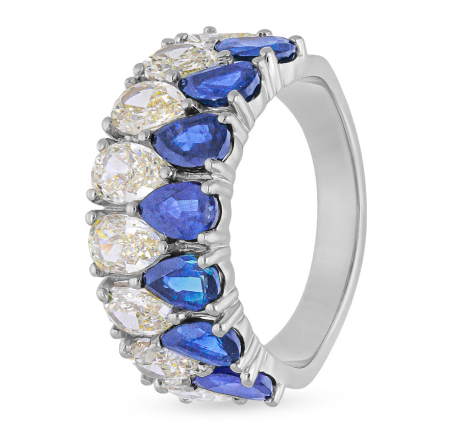 "Timeless Pear-Shaped Blue and White Diamond Ring in Classic Setting"